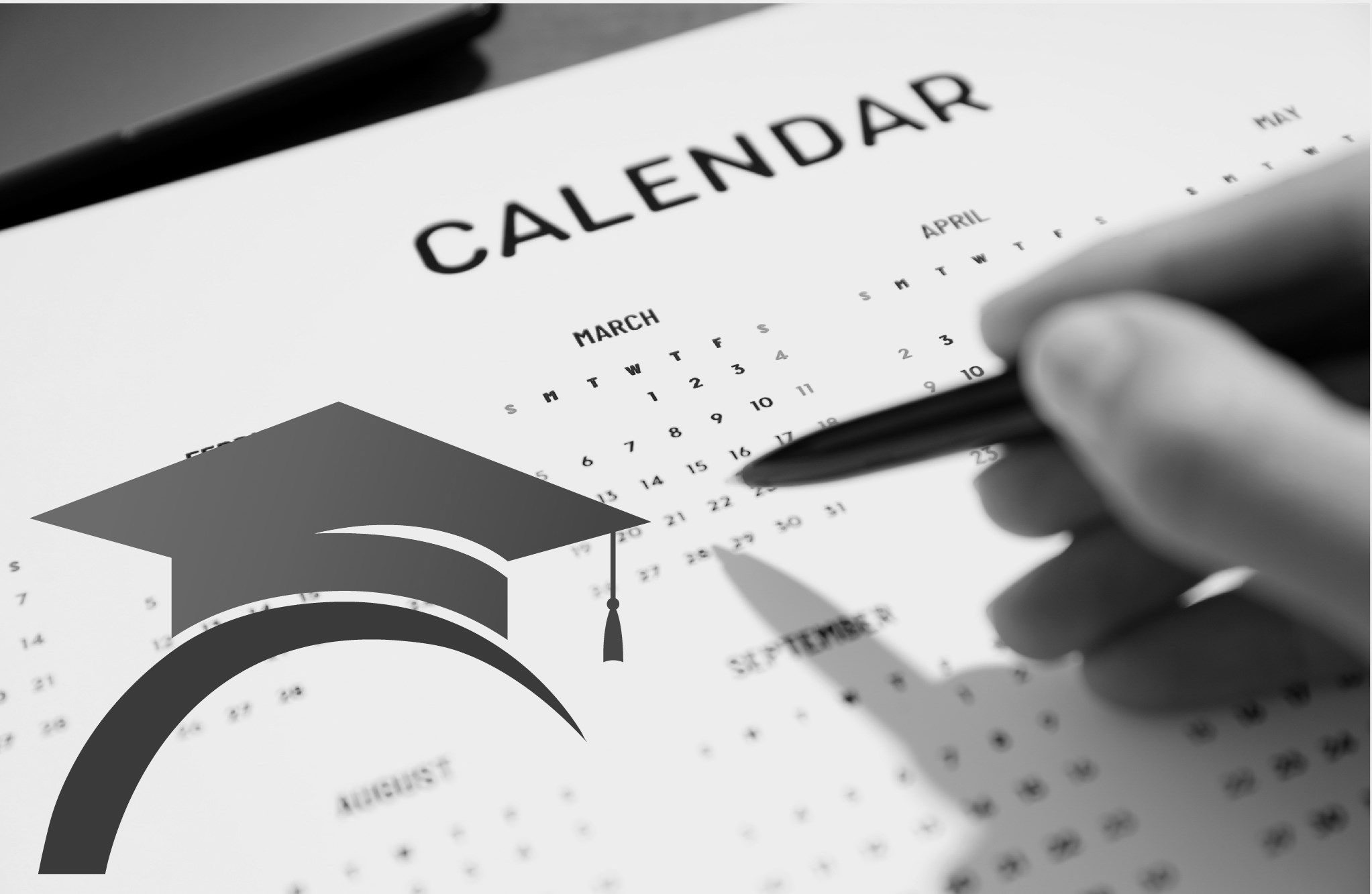 Hand marking dates on a calendar next to a graduation cap icon