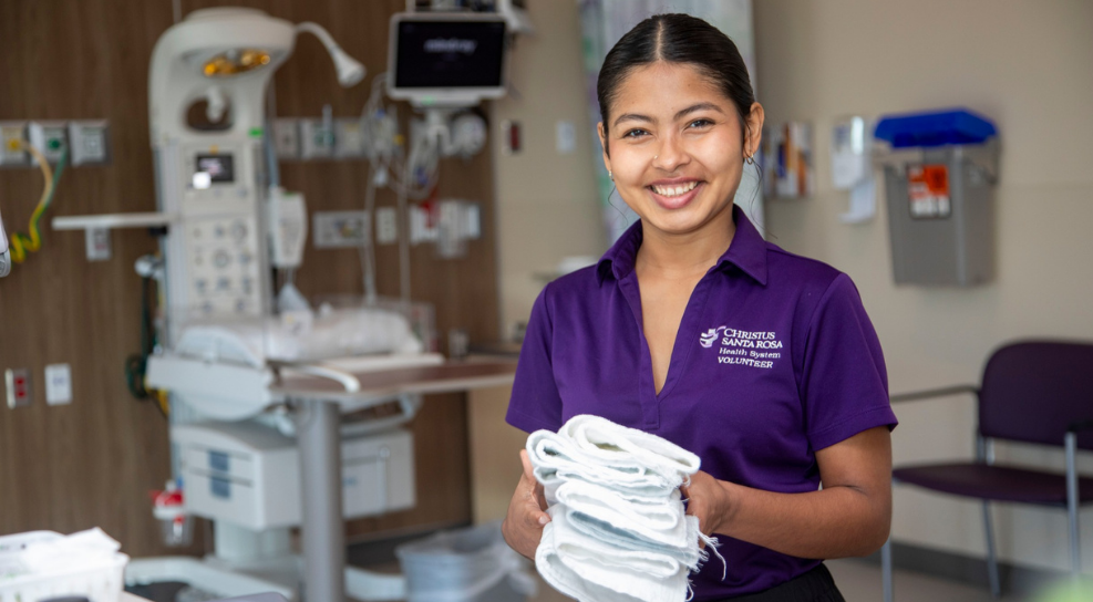 Female student smiling at camera
