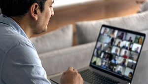 AlamoONLINE male student studying on laptop