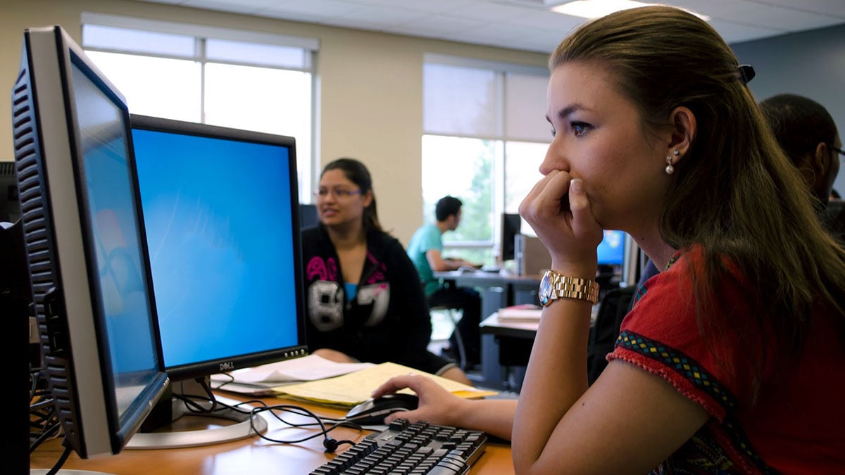 student studying at a computer