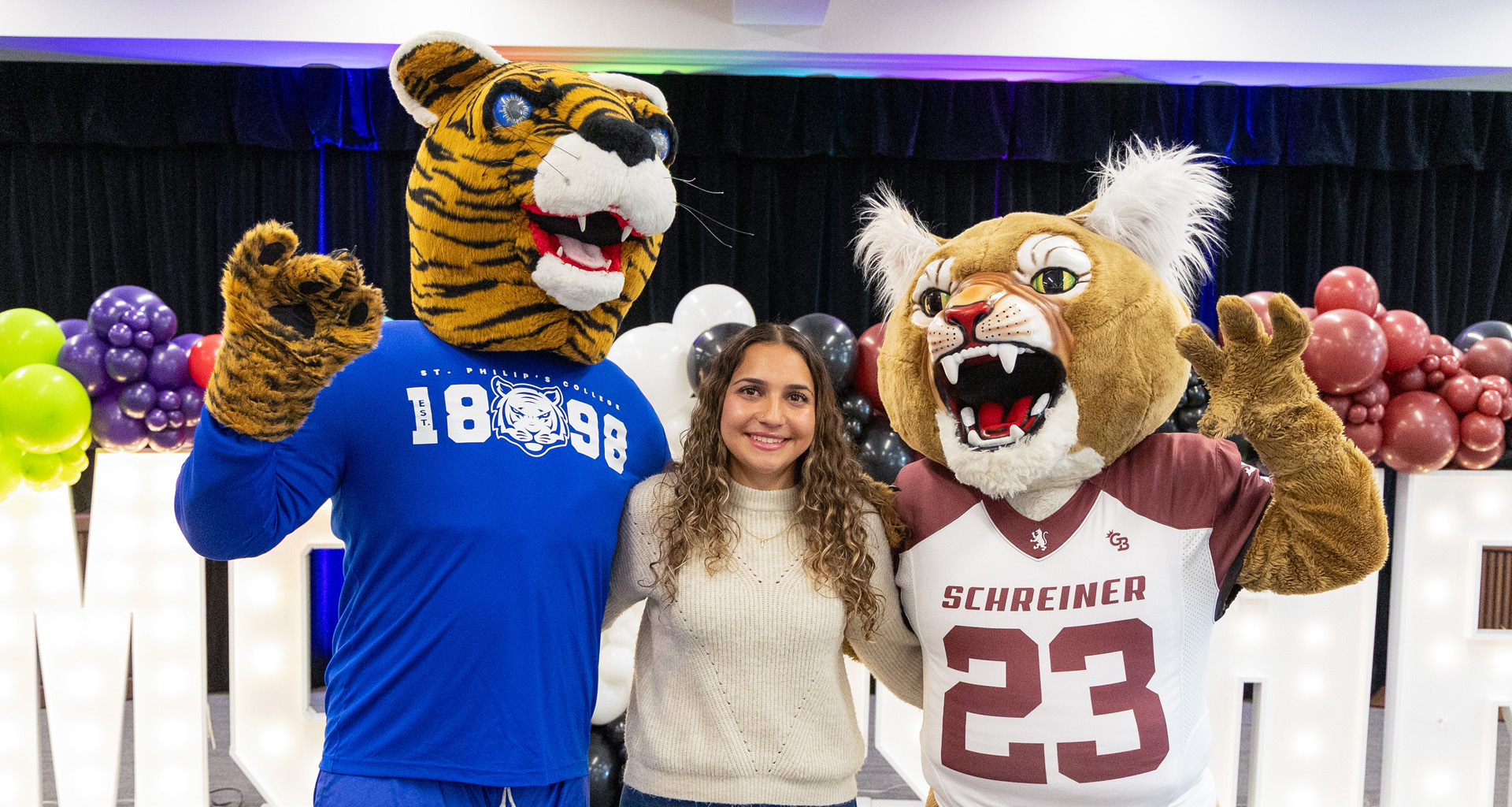 Schreiner and SPC Mascots with Student