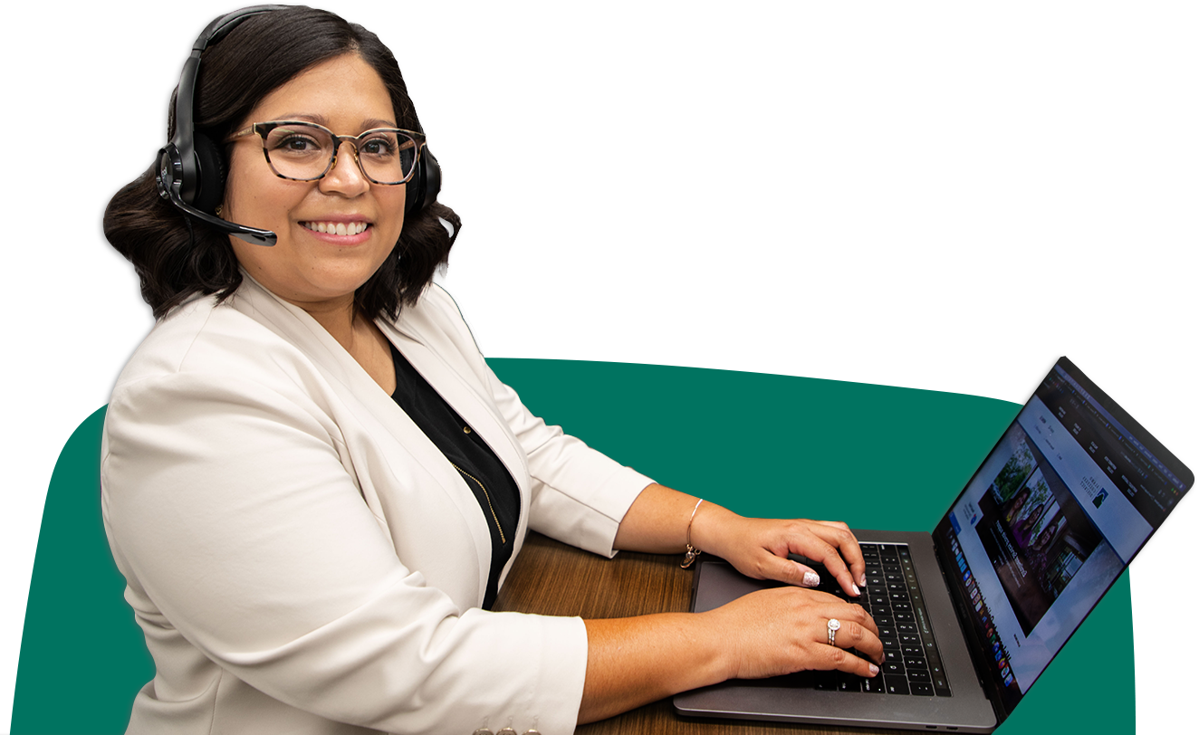 Female enrollment coach with headset and laptop ready to help students