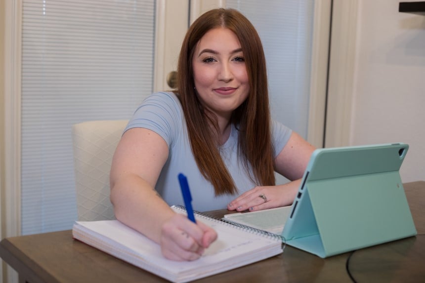 Alamo Colleges Online  student taking notes