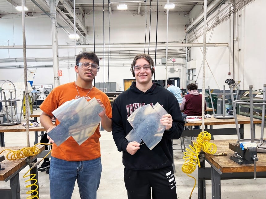 two male students in the aerospace lab