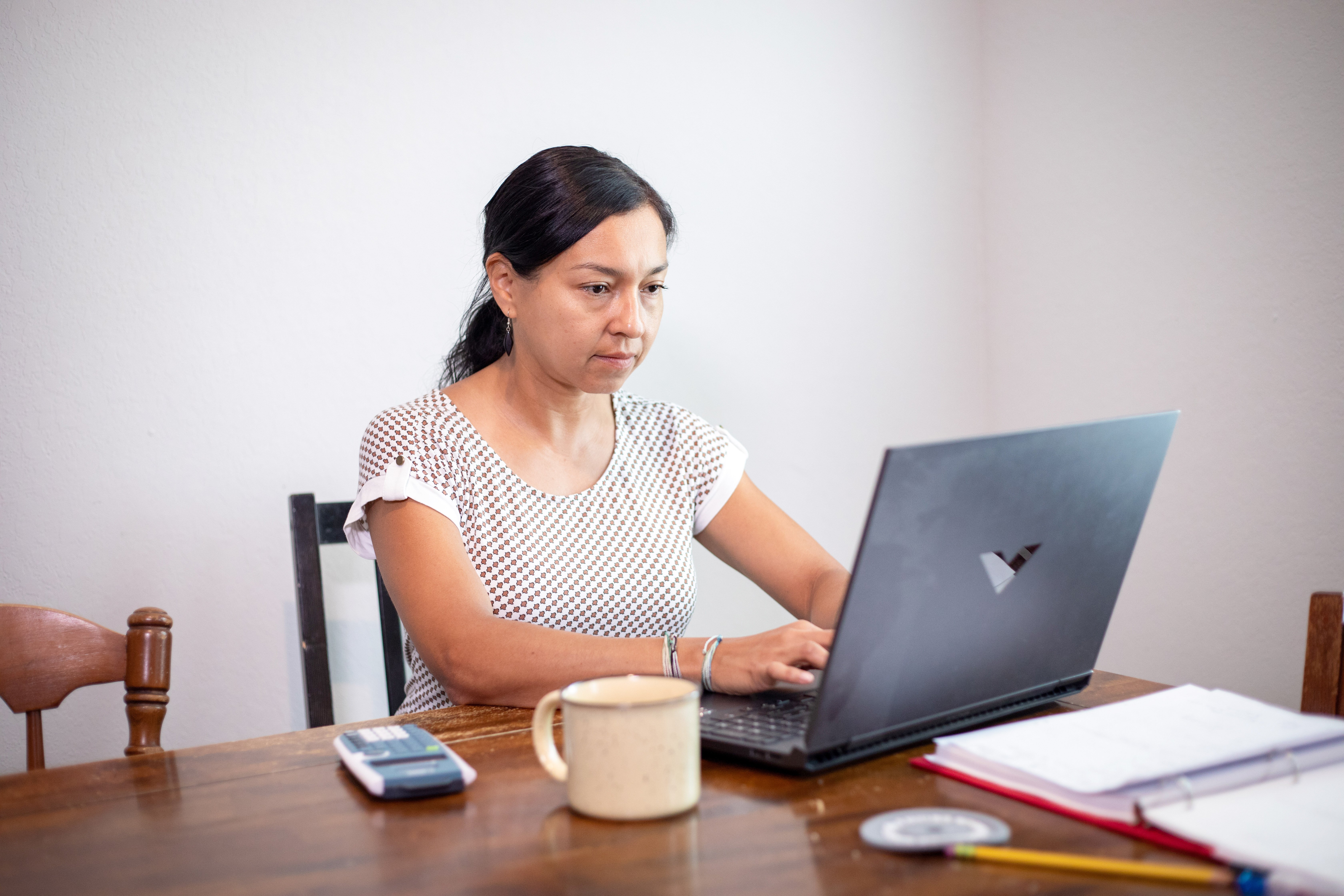 AlamoONLINE student ambassador studying at home