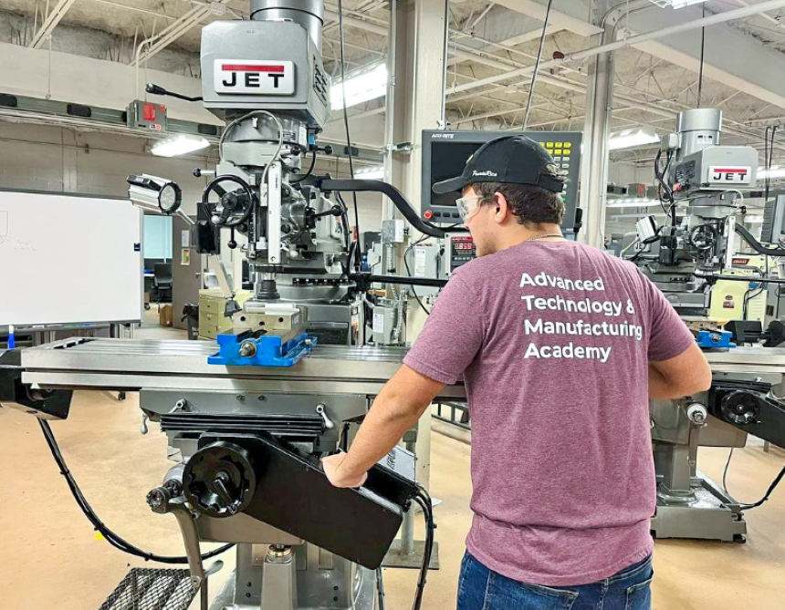 male college student in manufacturing lab