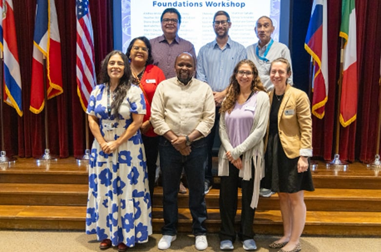 diverse group of people standing on a stage