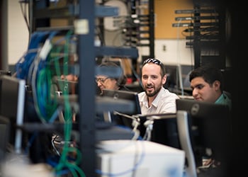 Students working in a lab with network servers