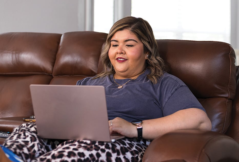 Alamo Colleges Online student on laptop