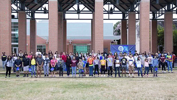 Youths standing in the SPC courtyard