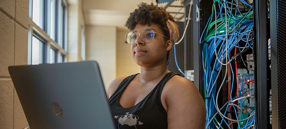 Low-cost internet Student studying on laptop