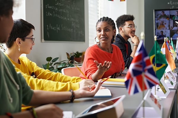 International students having discussions in a classroom