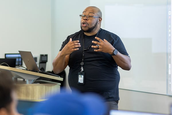 Male college teacher in the classroom image