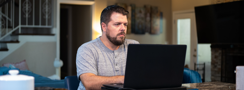 AlamoONLINE male student studying