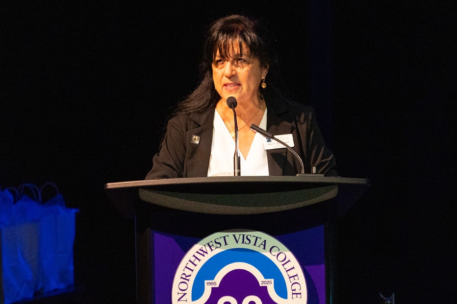 woman speaking at podium