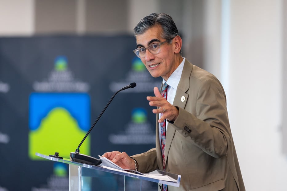 dr flores speaking at podium
