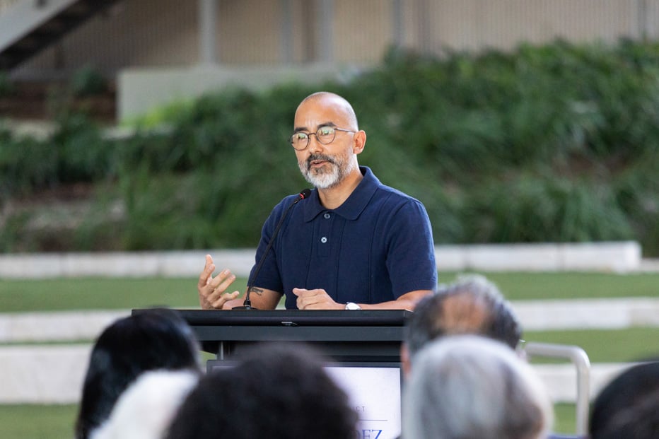 Vincent Valdez speaking at podium